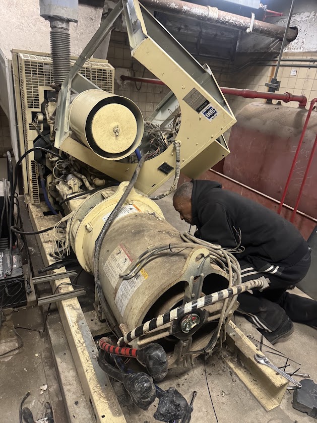 Technician servicing industrial generator at A2Z Pump Repair NYC